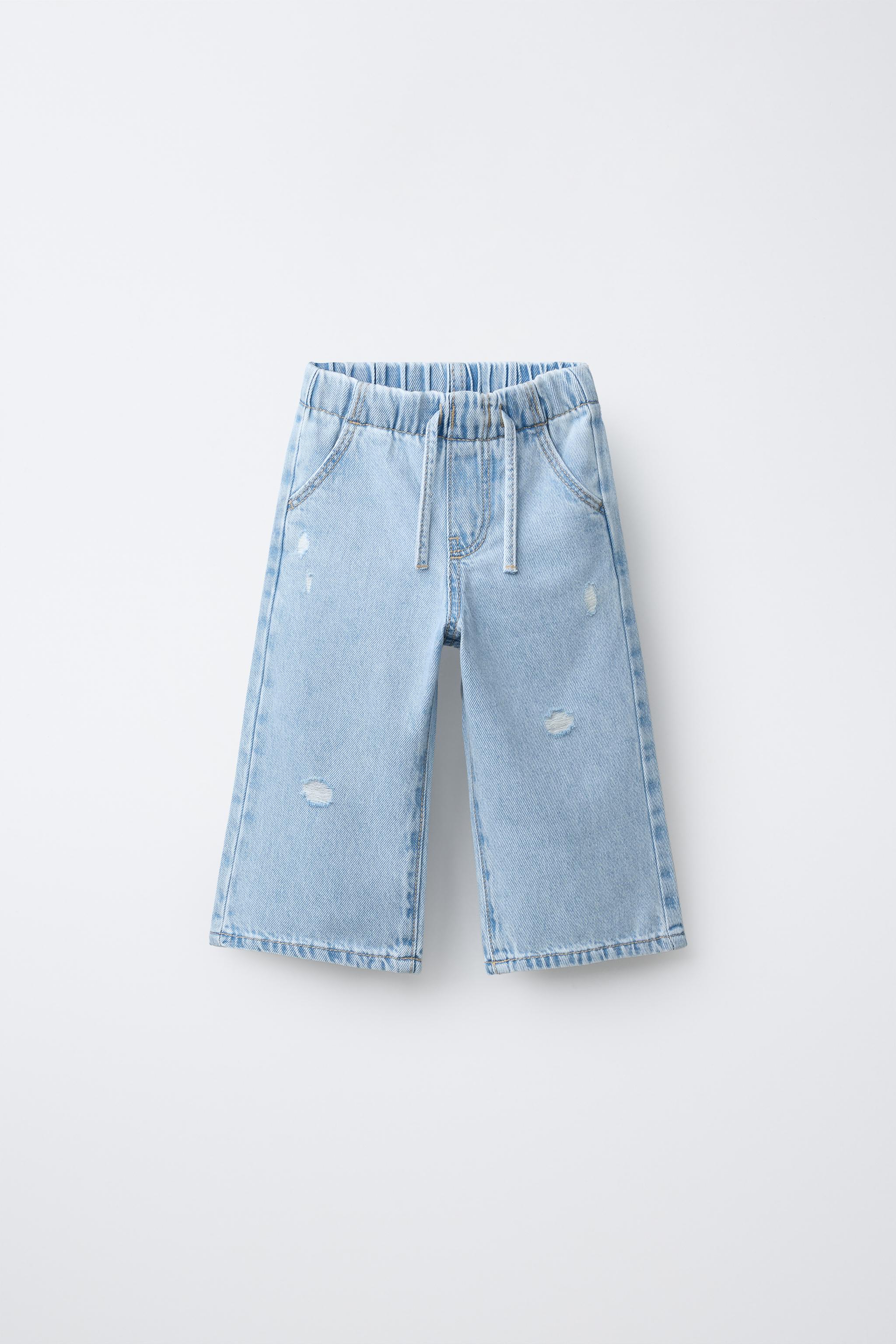 JEAN WIDE LEG À DÉCHIRURES